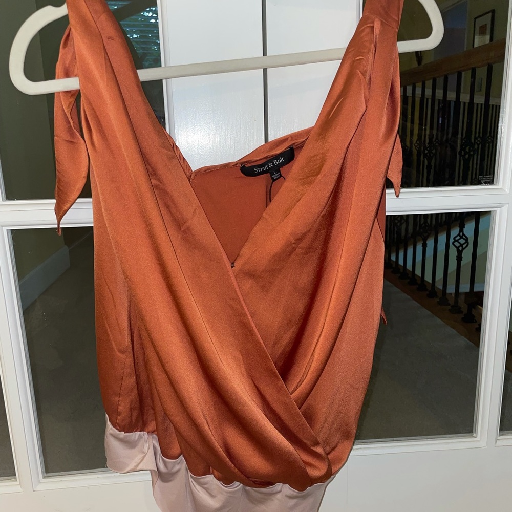 Boutique orange silk v-neck bodysuit